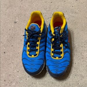 Nike womans Blue and Yellow Sneakers.